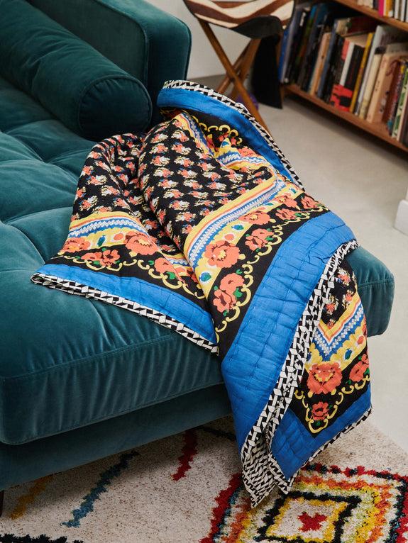 Reversible quilted blanket